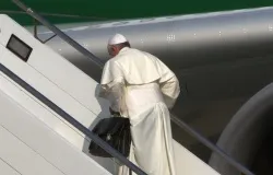 Pope Francis boards the papal plane carrying his black bag at Rome's Fiumicino Airport on July 22, 2013. ANSA/TELENEWS.?w=200&h=150