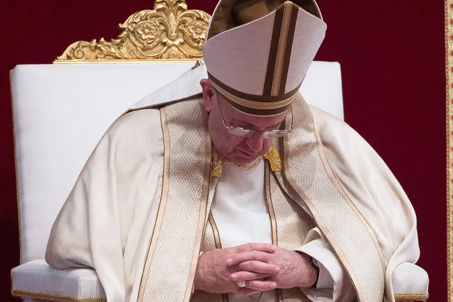 Pope Francis bowed in prayer in St. Peter's Basilica September 2015. ?w=200&h=150