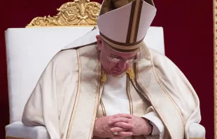 Pope Francis bowed in prayer in St. Peter's Basilica September 2015.   L'Osservatore Romano.