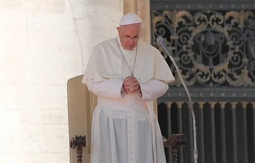Pope Francis bows his head in prayer during a Wednesday general audience Oct. 2, 2013. ?w=200&h=150