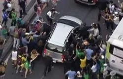 Pope Francis' car is swarmed by pilgrims as he makes his way to Guanabara Palace on July 22, 2013. ANSA/FERMO IMMAGINE SKY.?w=200&h=150