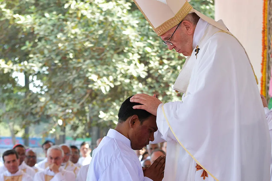 Pope Francis lays hands on a Bangladeshi deacon as he ordains him to the priesthood during a Dec. 1, 2017 Mass in Dhaka. ?w=200&h=150