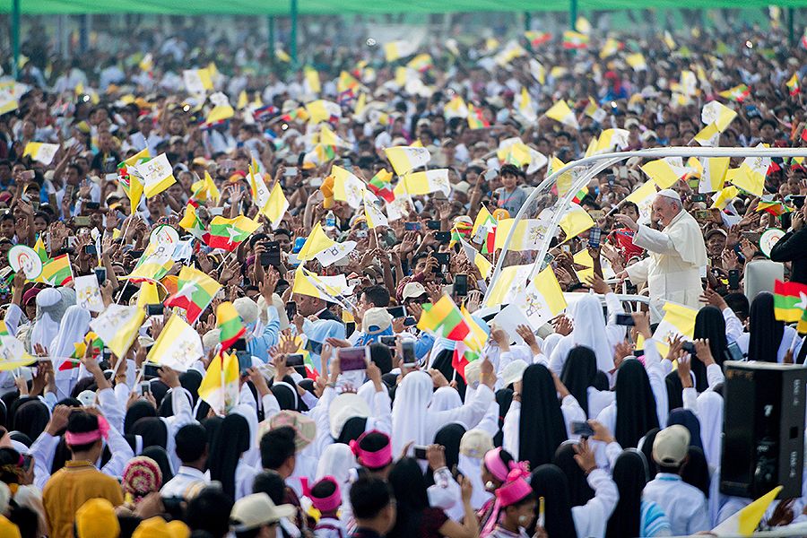 Pope Francis is greeted by crowds as he prepares to say Mass in Yangon, Burma, Nov. 29, 2017. ?w=200&h=150