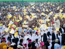 Pope Francis is greeted by crowds as he prepares to say Mass in Yangon, Burma, Nov. 29, 2017. 