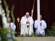 Pope Francis prays during Mass on May 30, 2013. 
