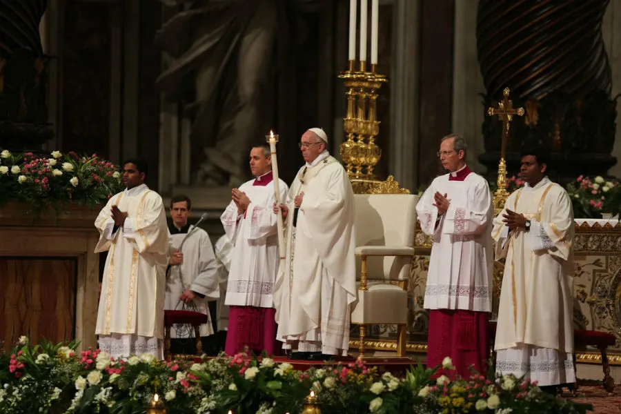 Pope Francis celebrates the Easter Vigil at St Peters basilica. ?w=200&h=150