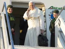 Pope Francis prepares to board the papal plane, Jan. 15, 2018. 