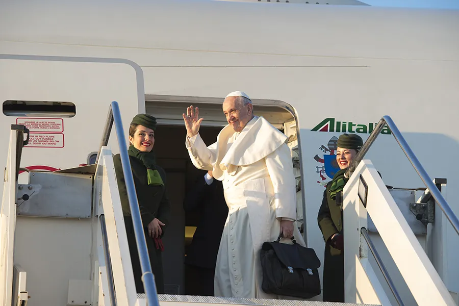 Pope Francis boards the papal plane in Rome, Jan. 15, 2018. ?w=200&h=150