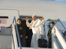 Pope Francis boards the papal plane in Rome, Jan. 15, 2018. 