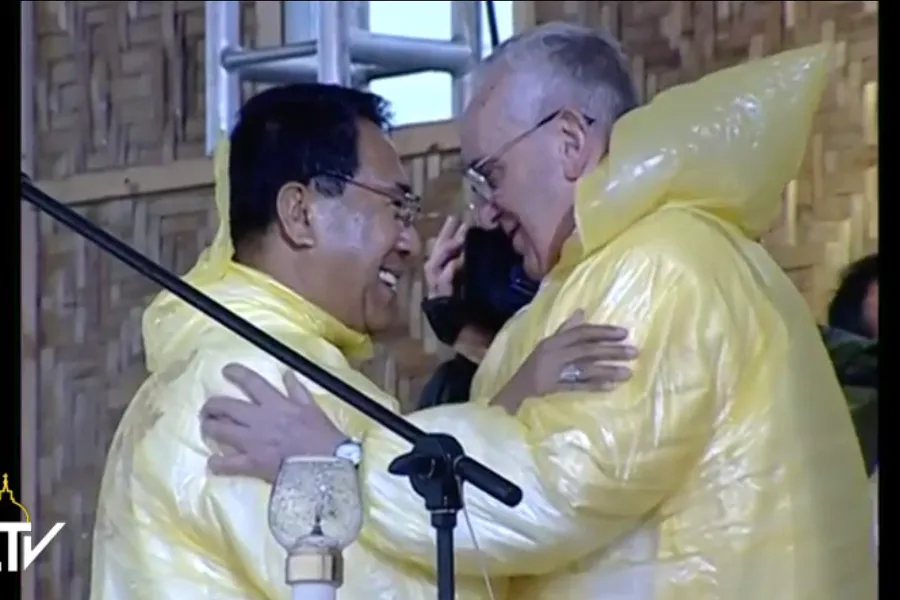 Pope Francis and Archbishop John Du embrace at a Mass in Tacloban Jan. 17. ?w=200&h=150