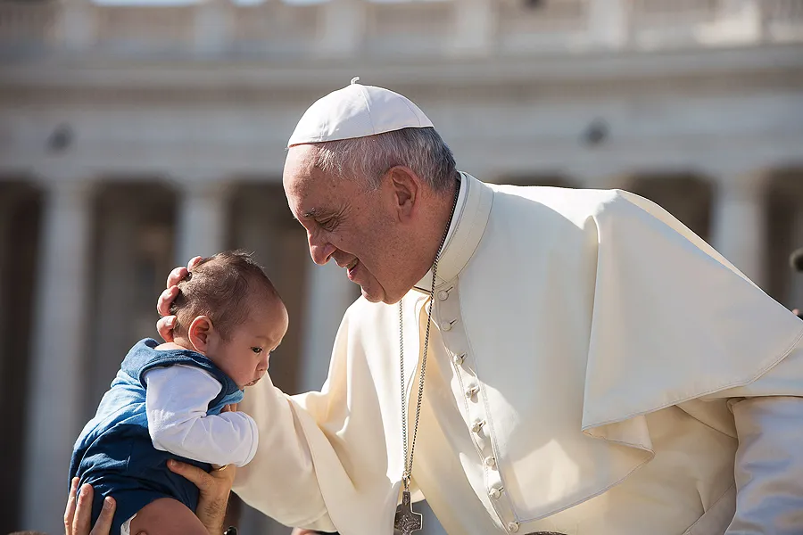 Pope Francis embraces a baby during the general audience in St. Peter's square on Aug. 26, 2015. ?w=200&h=150