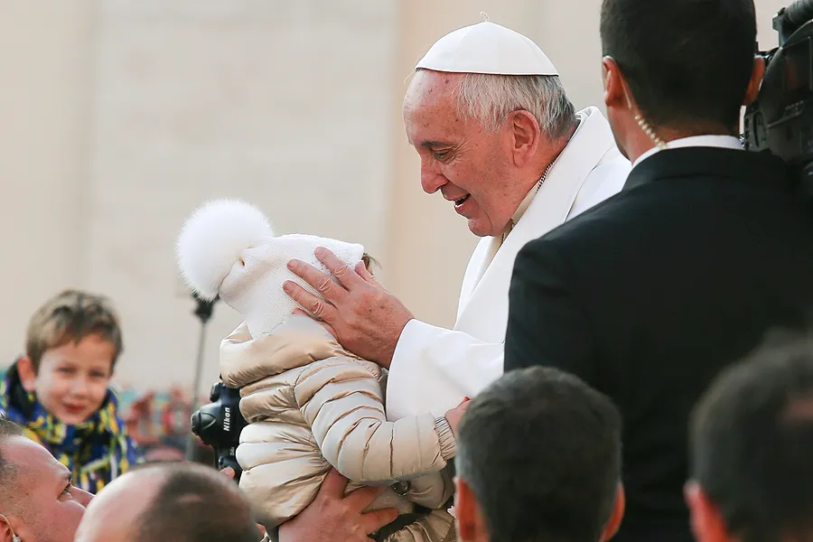 Pope Francis embraces a child at the general audience in St. Peter's Square, Dec. 16, 2015. ?w=200&h=150