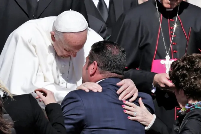 Pope Francis embraces a man at the Wednesday General Audience March 29 2017 Credit Lucia Ballester CNA