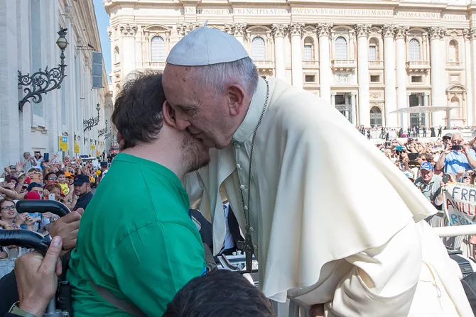 Pope Francis embraces a man in a wheelchair at the Wednesday general audience in St Peters Square on June 10 2015 Credit   LOsservatore Romano CNA 6 10 15