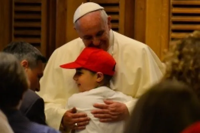 Pope Francis embraces a young student on May 31 22014 in Paul VI audience hall Credit Daniel Ibez CNA