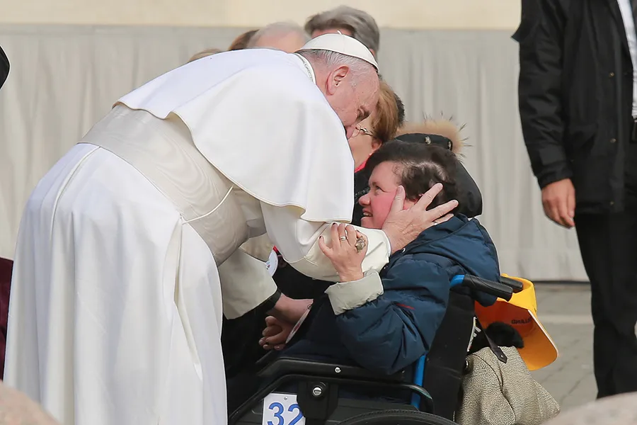 Pope Francis embraces an individual with disabilities at the general audience in St. Peter's Square, Jan. 27, 2016. ?w=200&h=150
