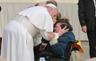 Pope Francis embraces an individual with disabilities at the general audience in St. Peter's Square, Jan. 27, 2016.   Daniel Ibanez/CNA.