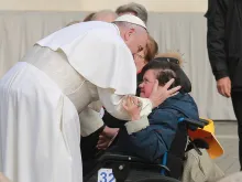 Pope Francis embraces an individual with disabilities at the general audience in St. Peter's Square, Jan. 27, 2016. 
