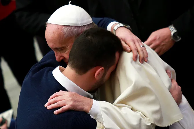 Pope Francis embraces man at the general audience in Paul VI Hall on Jan 13 2016 Credit Daniel Ibanez CNA 1 13 16