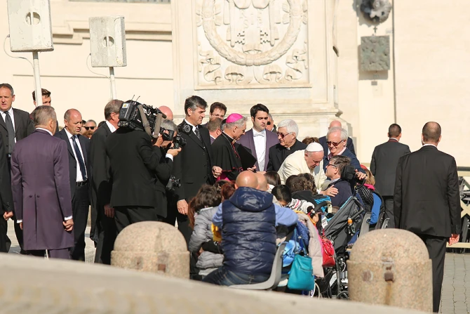 Pope Francis embraces the disabled at the general audience in St Peters Square Nov 11 2015 Credit Daniel Ibanez CNA 11 11 15