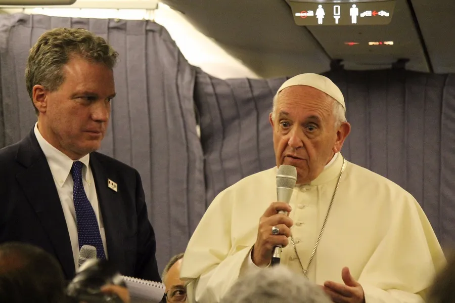  Pope Francis speaks aboard the papal plane from Lima, Peru to Rome Jan. 22, 2018. ?w=200&h=150