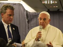  Pope Francis speaks aboard the papal plane from Lima, Peru to Rome Jan. 22, 2018. 