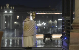 Pope Francis gives an extraordinary Urbi et Orbi blessing from the loggia of St. Peter's Basilica March 27, 2020.   Vatican Media.