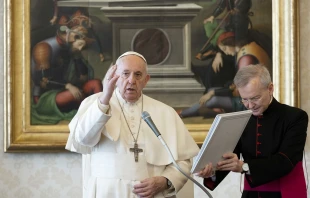 Pope Francis gives his apostolic blessing at the end of the general audience March 18, 2020.   Vatican Media.