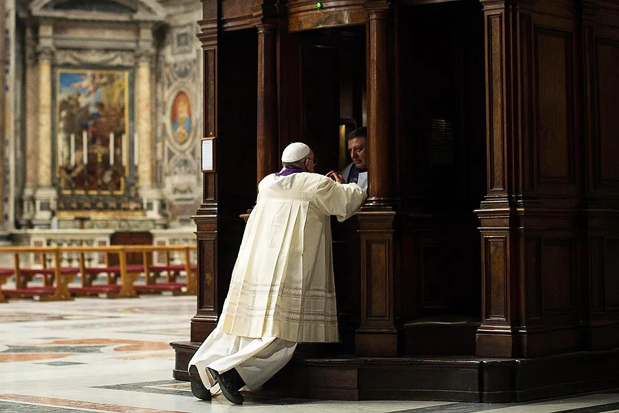 Pope Francis goes to Confession during a penitential celebration at St. Peter's Basilica, March 28, 2014. ?w=200&h=150