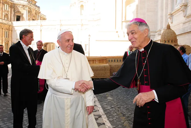 Pope Francis greets Archbishop Edoardo Menichelli at the Vatican Jan 4 2015 Credti ANSA CNA 2 5 15
