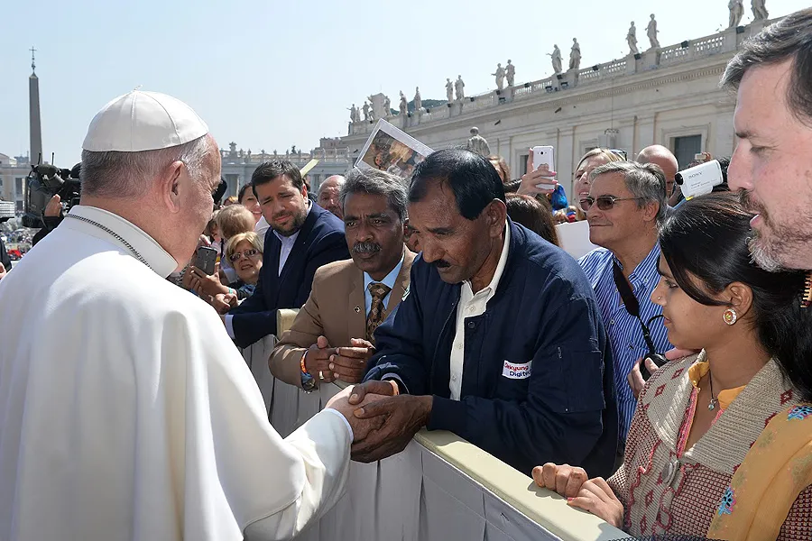 Pope Francis greets Ashiq Mesih in St. Peter's Square during the Wednesday general audience on April 15, 2015. ?w=200&h=150