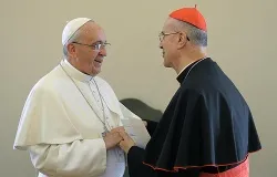 Pope Francis greets Cardinal Tarcisio Bertone during his farewell ceremony at the Vatican, Oct. 15, 2013. ?w=200&h=150