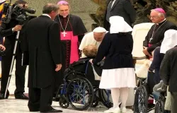 Pope Francis greets a woman in a wheelchair Nov. 23. ?w=200&h=150
