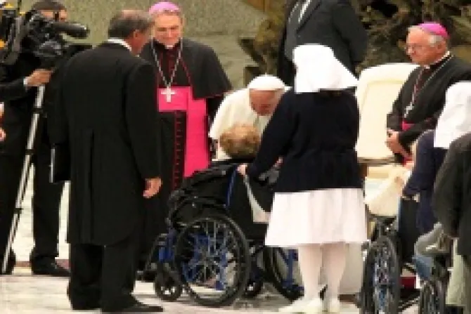 Pope Francis greets  woman in wheelchair Nov 23 Credit Lauren Cater CNA CNA