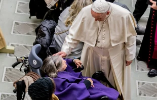 Pope Francis greets a woman before the general audience Dec. 19, 2018.   Daniel Ibanez/CNA.