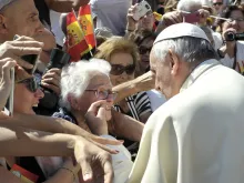 Pope Francis greets an elderly woman at the Wednesday general audience in St. Peter's Square on June 3, 2015. 