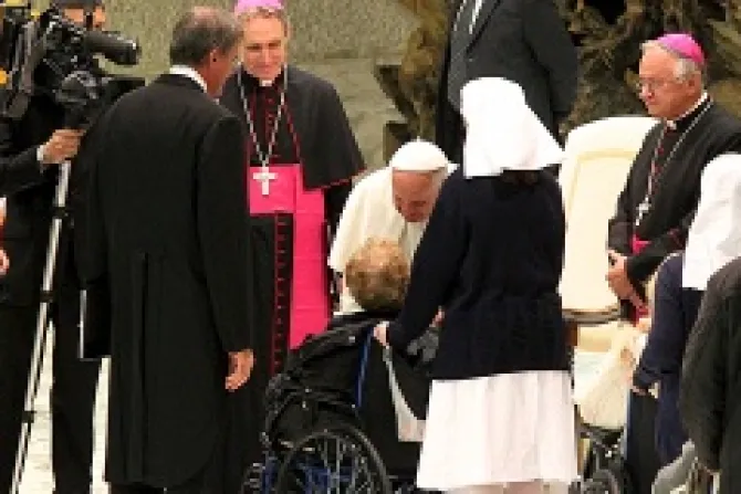 Pope Francis greets an elderly woman in a wheelchair Nov 23 2013 Credit Kerri Lenartowick CNA CNA 11 23 13