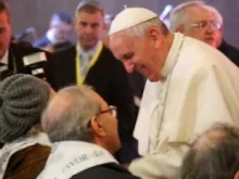 Pope Francis greets the elderly and disabled persons following his Holy Thursday Mass at Rome's Don Gnocchi facility 