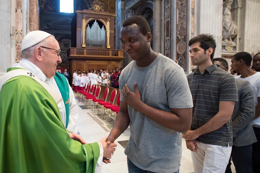 Pope Francis greets migrants July 6, 2018 after Mass for the anniversary of his visit to Lampedusa. ?w=200&h=150