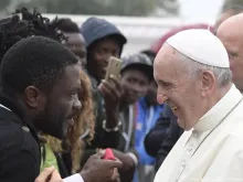 Pope Francis greets migrants at a welcoming hub near Cesena, Italy Oct. 1, 2017. 