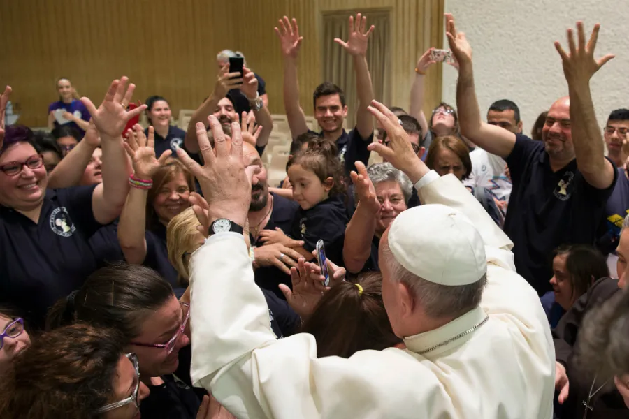 Pope Francis greets participants of the Convention for Persons with Disabilities at the Paul VI Hall in the Vatican, June 11, 2016. ?w=200&h=150