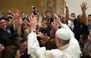 Pope Francis greets participants of the Convention for Persons with Disabilities at the Paul VI Hall in the Vatican, June 11, 2016.   L'Osservatore Romano.