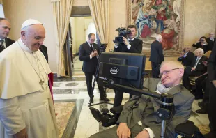 Pope Francis greets physicist Stephen Hawking in Vatican City.   Vatican Media.