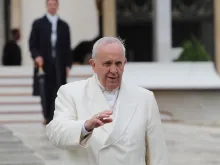 Pope Francis greets pilgrims during his March 25, 2015 general audience. 