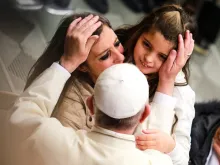 Pope Francis greets pilgrims during his general audience Jan. 13, 2016. 