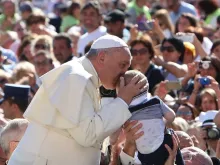 Pope Francis greets pilgrims in St. Peter's Square during the Wed. general audience on Sept. 3, 2014. 