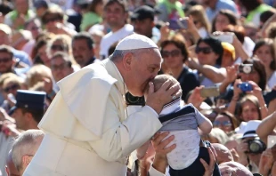 Pope Francis greets pilgrims in St. Peter's Square during the Wed. general audience on Sept. 3, 2014.   Daniel Ibanez/CNA.