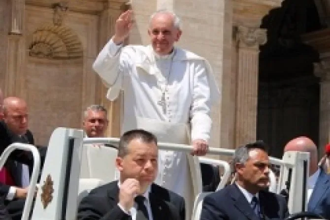 Pope Francis greets pilgrims in St Peters Square after Pentecost Sunday Mass on May 19 2013 CNA