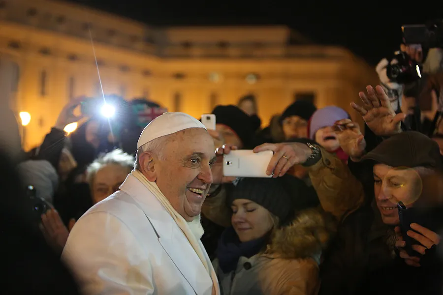 Pope Francis greets pilgrims in St. Peter's Square after Vespers on New Year's Eve, Dec. 31, 2014. ?w=200&h=150