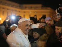 Pope Francis greets pilgrims in St. Peter's Square after Vespers on New Year's Eve, Dec. 31, 2014. 